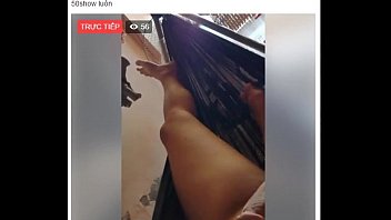Asian woman in different positions fucks her friend in the pussy